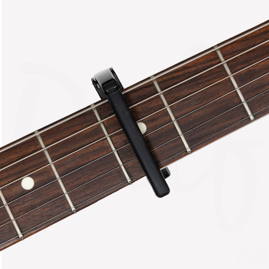 Tri-action Capo